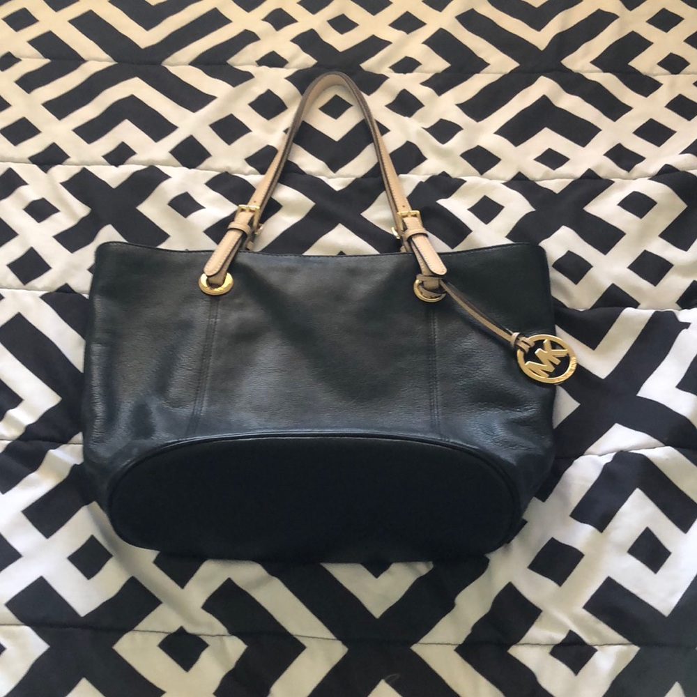 A big Michael Kors bag